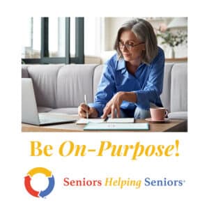 Be On Purpose! Senior female writing goals on notepad