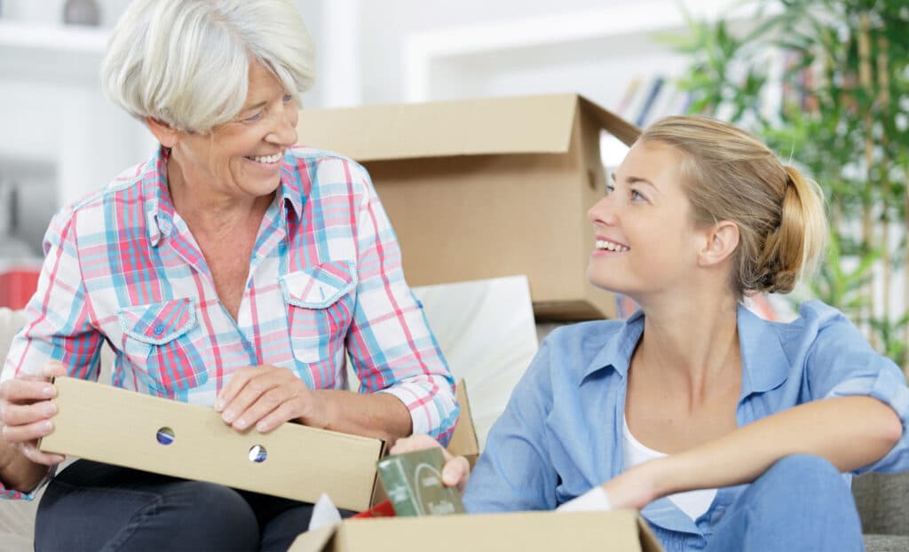 adult-child-talking-to-her-mom-about-decluttering