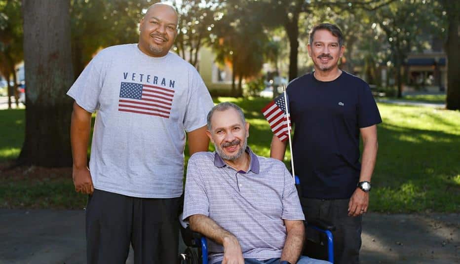 Veteran Caregivers Assisting Disabled Comrade