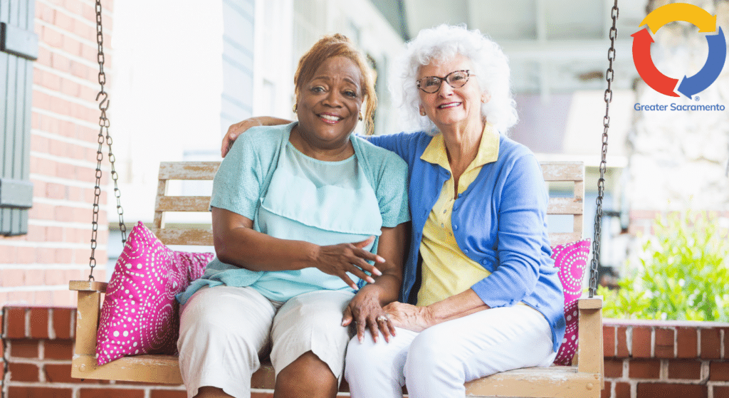 Senior companions enjoying time together on a porch swing
