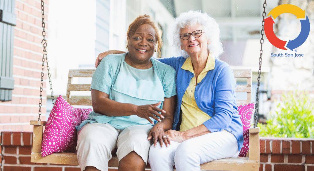 Senior companions enjoying time together on a porch swing